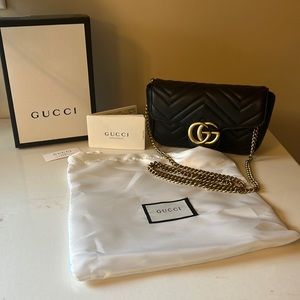Gucci
GG Marmont Flap Bag Matelasse Leather Super
Mini